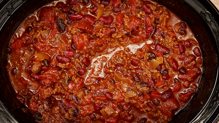 Making beef chili in crockpot